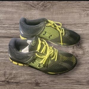 Under Armour 9.5 black with lighting green yellow shoes